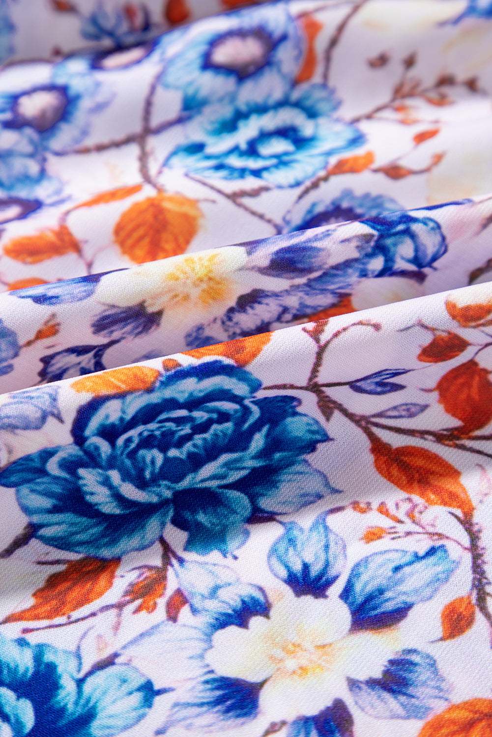 Brenna™ | Vestido azul cielo con estampado floral mixto, mangas cortas y cuello con abertura para atar